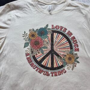 White and multi colored peace tshirt